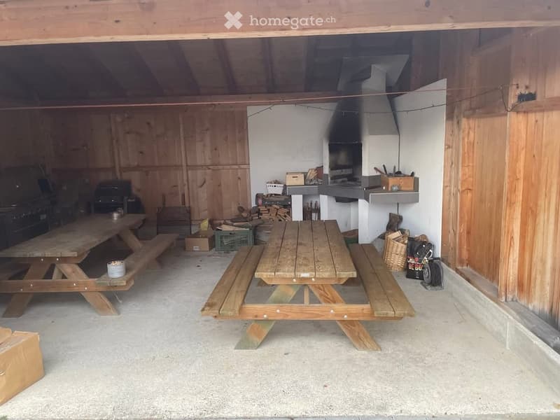 wooden storage box, wooden benches, wooden tables, barbecue stove