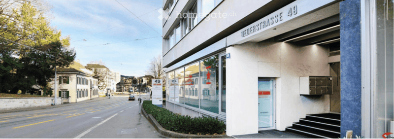 modern building, glass windows, white walls, stairs, mailbox, wide street