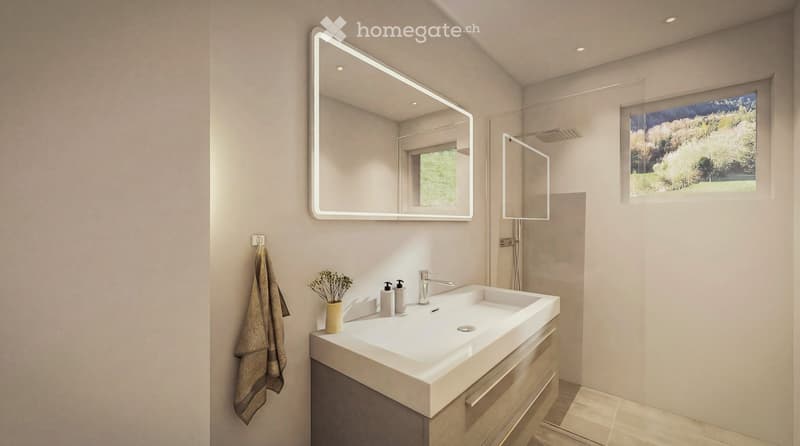Bathroom with a white sink, mirror, shower, and a window with a view of the outside.