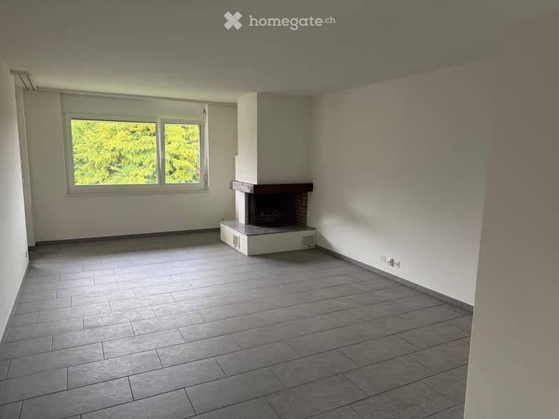 empty room, fireplace, large window, tiled floor, white walls