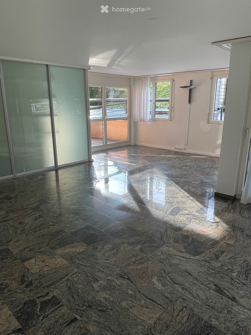 empty room, marble floor, glass sliding doors, balcony, windows with white curtains