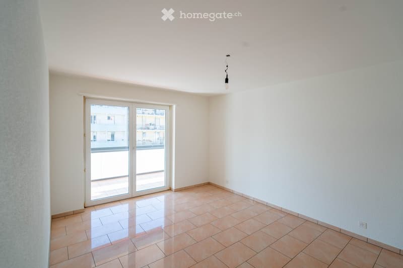 empty room, sliding glass door, balcony, tiled floor, white walls