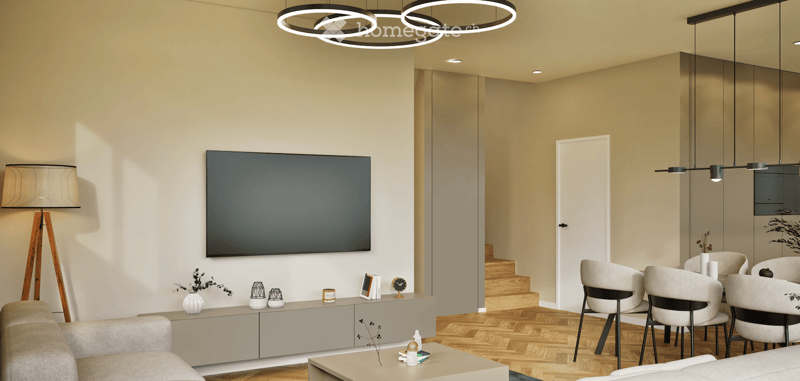 Furnished Room. Modern living room with a grey sofa, coffee table, TV, floor lamp, and dining area with chairs and table.