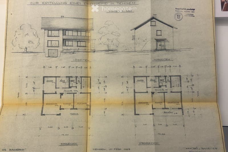 Architectural floor plan showing ground and upper floors of a residential building, including living room, kitchen, bedrooms, bathrooms, and a balcony.