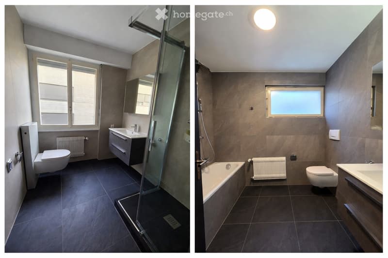 Modern bathroom with dark tiled floors, a bathtub, toilet, sink, and a glass shower enclosure. Features include a radiator, a mirror, and a window with blinds.