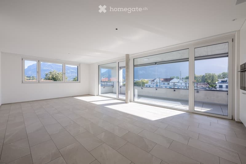 empty room, large sliding glass doors, balcony with railing, white walls, wooden tiles