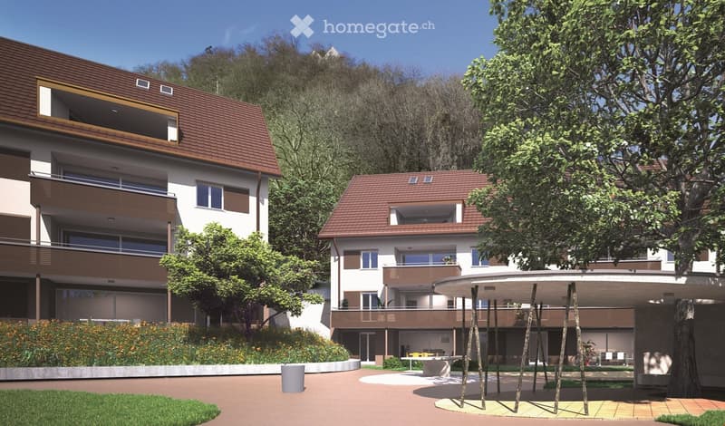 Two story building, brown roof, balconies, outdoor seating area, large trees