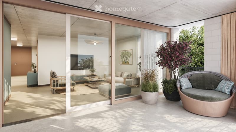 Modern living room with large glass sliding doors leading to a balcony, featuring a sofa, coffee table, ottoman, side table, and television. The balcony has a wicker chair, potted plants, and a view of greenery.