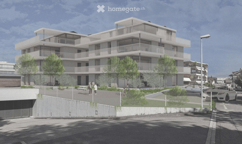 Modern multi-story residential building with balconies, surrounded by greenery and parking area.
