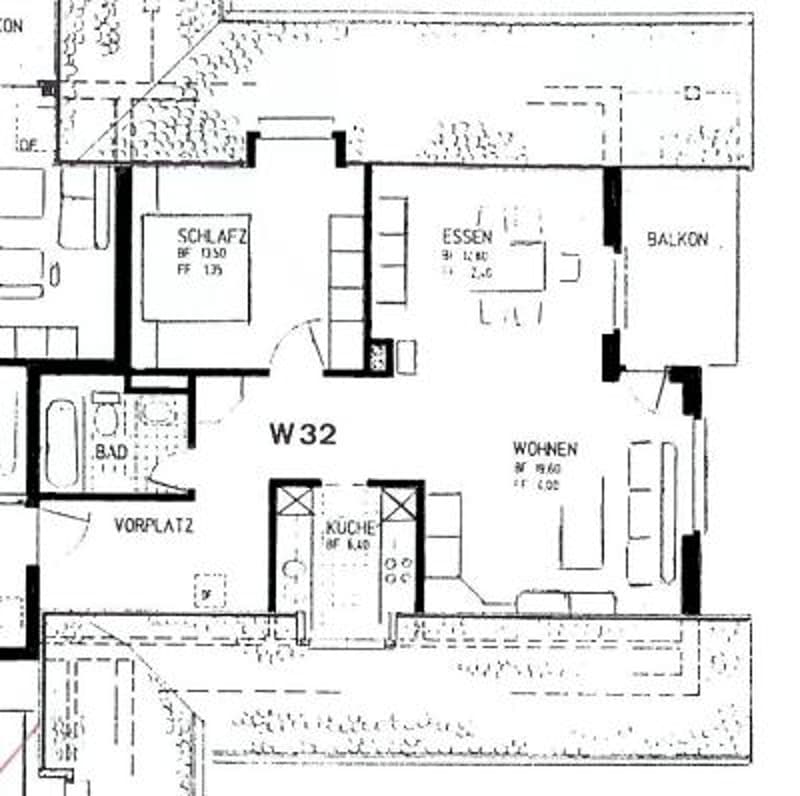 Floor plan showing a multi-room layout including a kitchen, living area, bedroom, bathroom, and balcony.