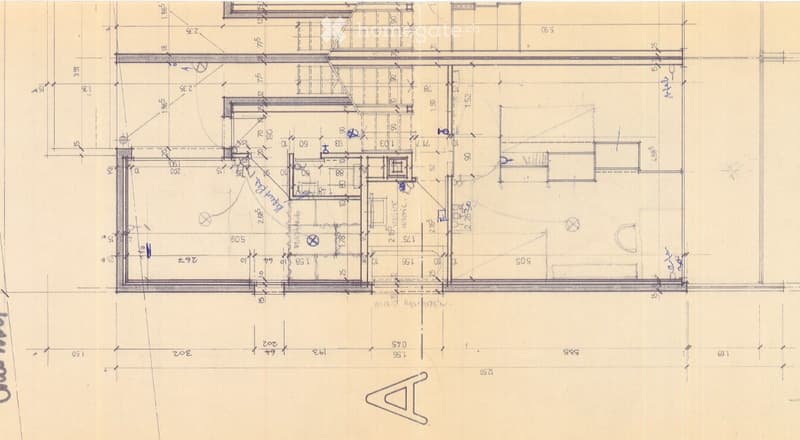 Floor plan of a residential space showing multiple rooms including a living area, bedrooms, bathrooms, and a kitchen.