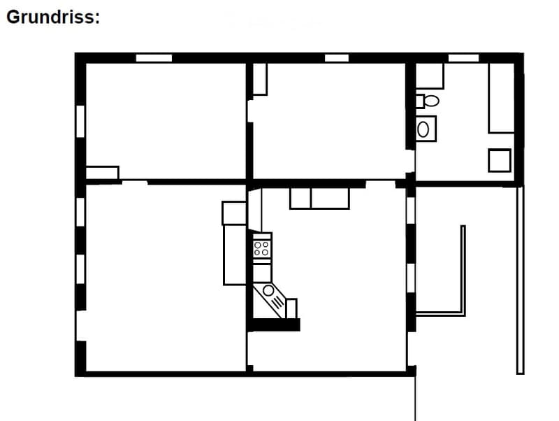 Floor plan showing a layout with multiple rooms including a living area, kitchen, bedrooms, and bathrooms.