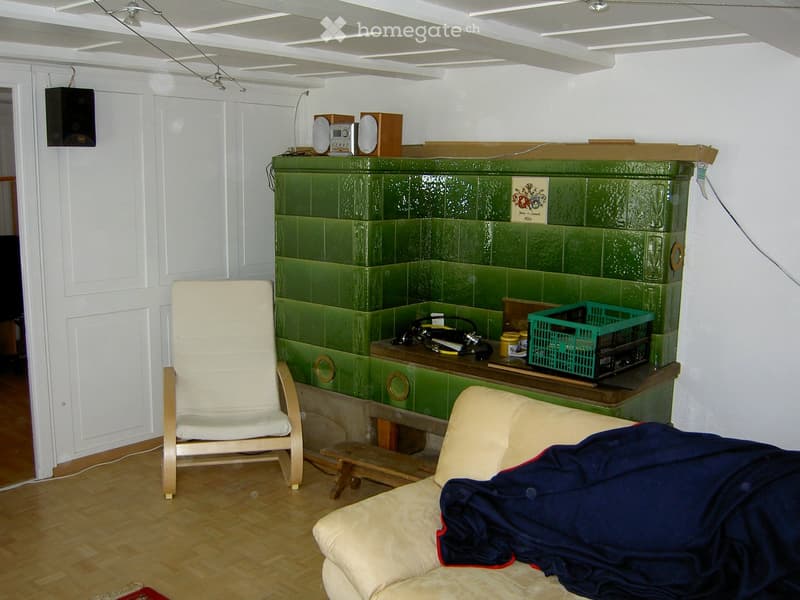 {"type": "Furnished Room", "objects": ["sofa", "chair", "table", "radiator", "radiator cover", "radiator painting", "radiator speaker", "radiator speaker", "radiator speaker", "radiator speaker", "radiator speaker", "radiator speaker", "radiator speaker",