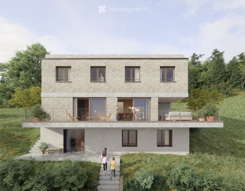 Modern two-story house with a raised ground floor, brick facade, large windows, and a spacious balcony with outdoor furniture.
