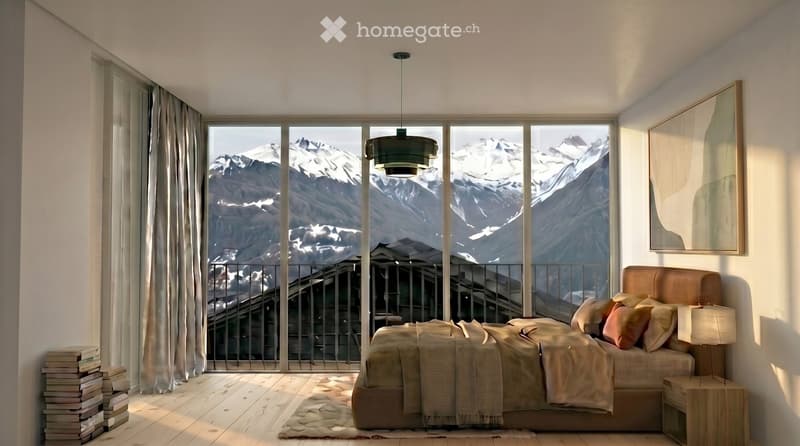 Modern bedroom with large windows offering a scenic mountain view, featuring a bed with pillows and blankets, a nightstand with a lamp, a mirror, and a stack of books near the window.