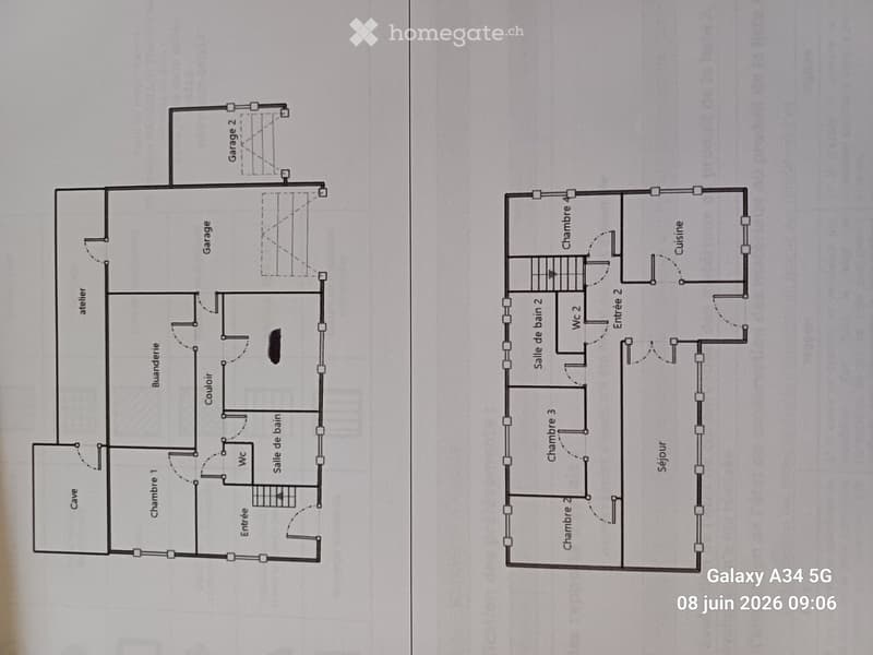 Floor plan of a two-story house with multiple rooms including living room, bedrooms, bathrooms, garage, and entrance.