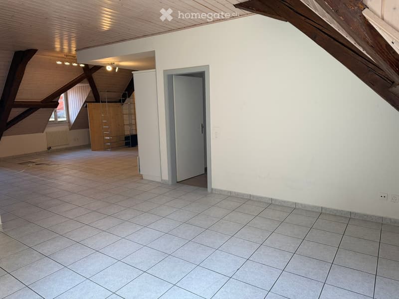 empty room, white tiled floor, wooden beams, white walls, door, window, radiator, ladder