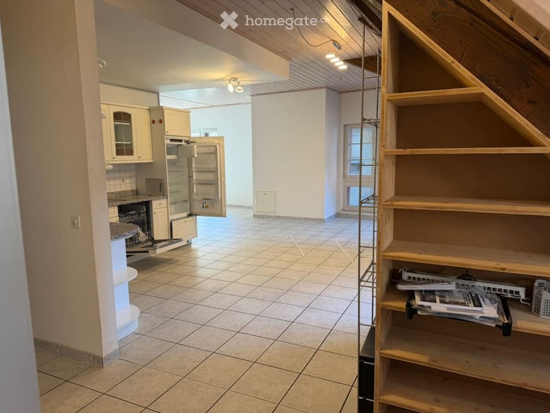 empty room, tiled floor, open kitchen, refrigerator, dishwasher, wooden staircase