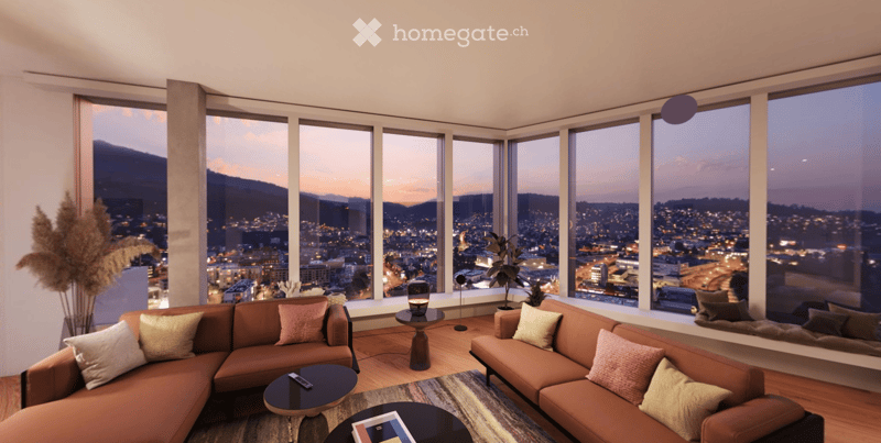 Modern living room with large windows offering a cityscape view, featuring a brown sectional sofa, coffee tables, table lamp, floor lamp, and a potted plant.