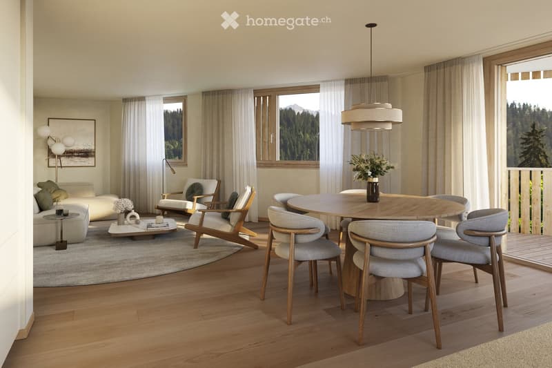 Modern living and dining area with large windows, a round wooden dining table, grey upholstered chairs, a white sofa, and a coffee table.