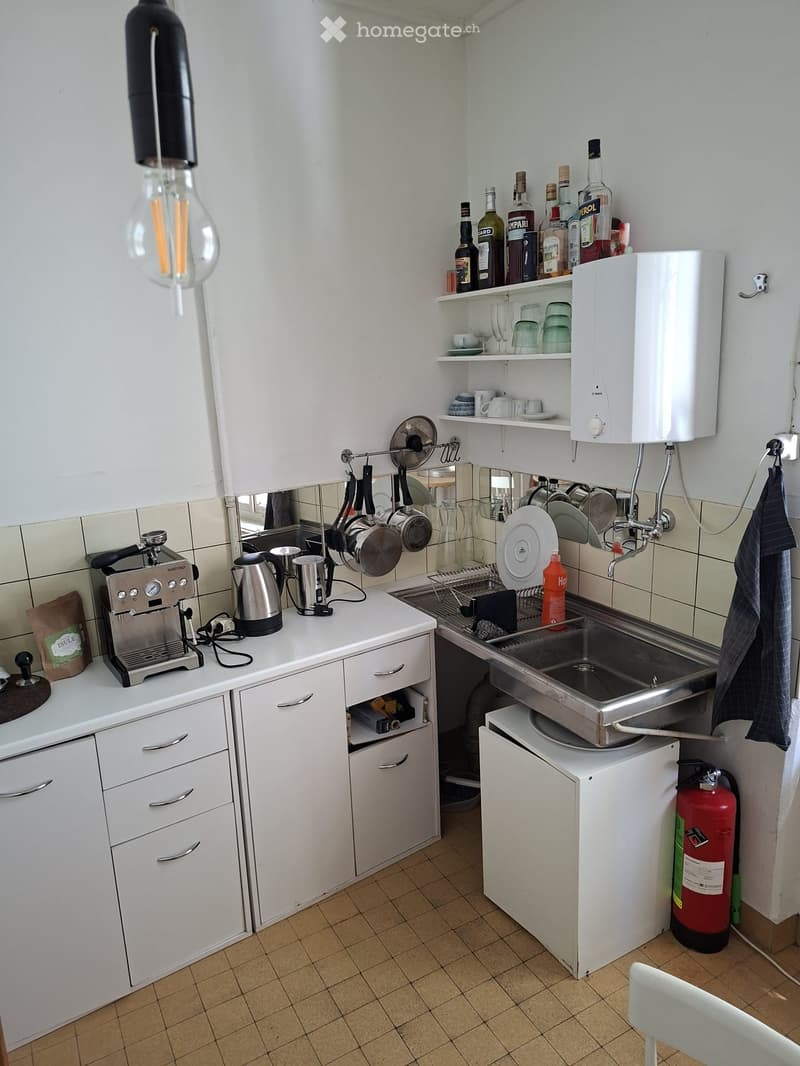 {"type": "Kitchen", "objects": ["coffee maker", "electric kettle", "faucet", "sink", "cupboard", "bottle", "cup", "faucet", "faucet", "faucet", "faucet", "faucet", "faucet", "faucet", "faucet", "faucet", "faucet", "faucet", "faucet", "faucet", "faucet", "