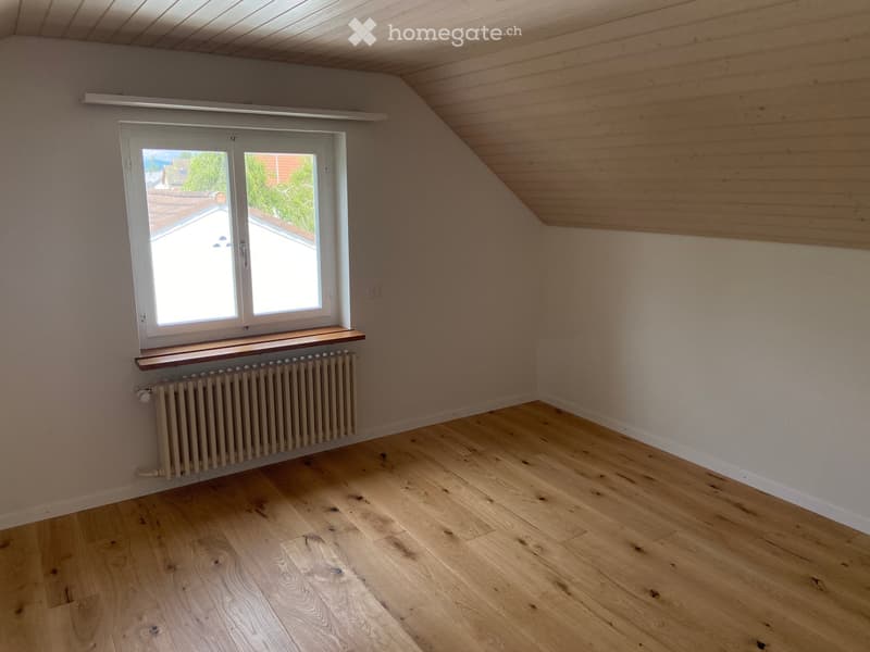 empty room, wooden floor, white walls, window with wooden frame, radiator