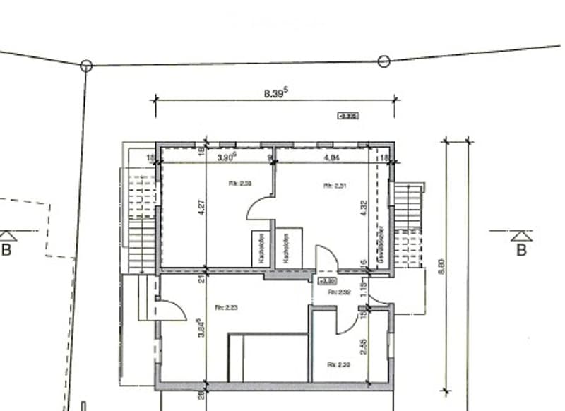 Floor plan of a residential unit showing a living room, kitchen, two bedrooms, and two bathrooms. Dimensions and room labels are indicated.