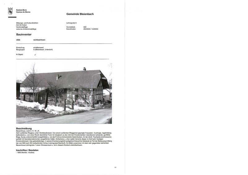 Document page showing a historical building inventory for Gemeinde Bleienbach, including a photograph of a traditional Swiss farmhouse with a tiled roof, chimney, and surrounding trees.