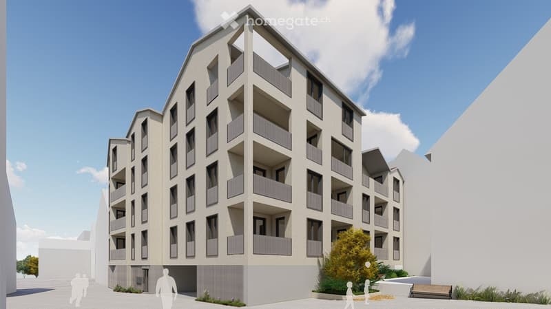 Modern multi-story residential building with balconies and large windows, surrounded by greenery and a paved area.