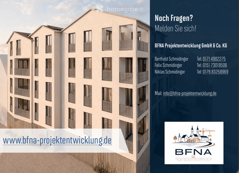 Modern multi-story residential building with balconies and large windows, featuring a clean and contemporary design.