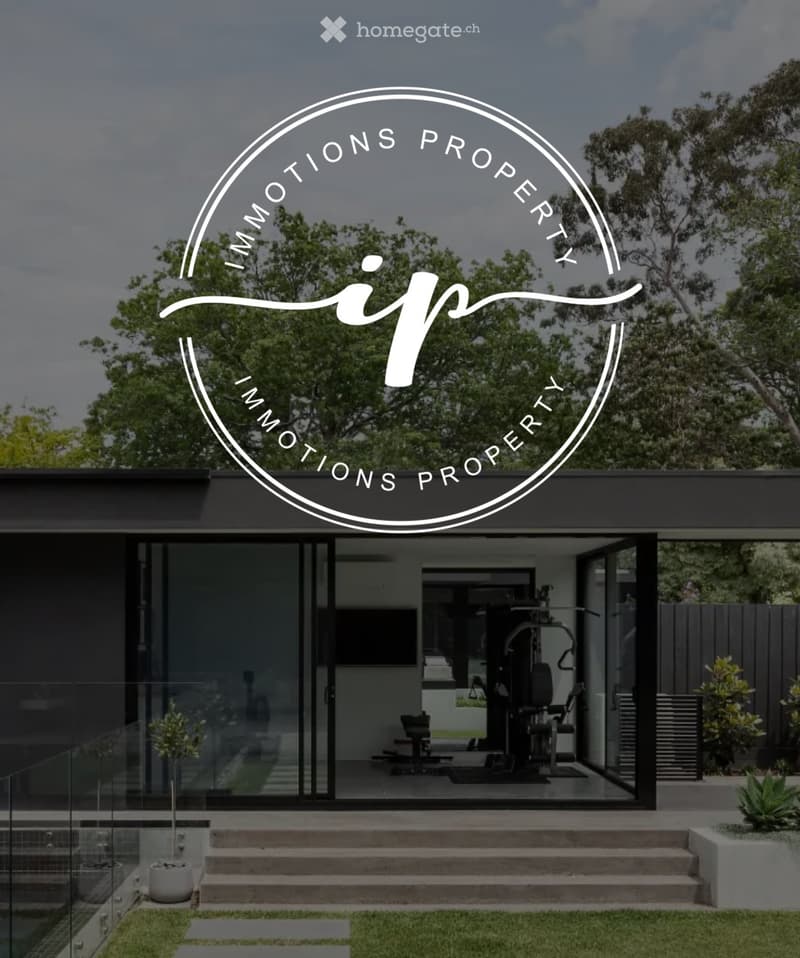 Modern two-story house with large glass windows and a raised ground floor, featuring a fitness area inside and a landscaped garden with steps leading up to the entrance.