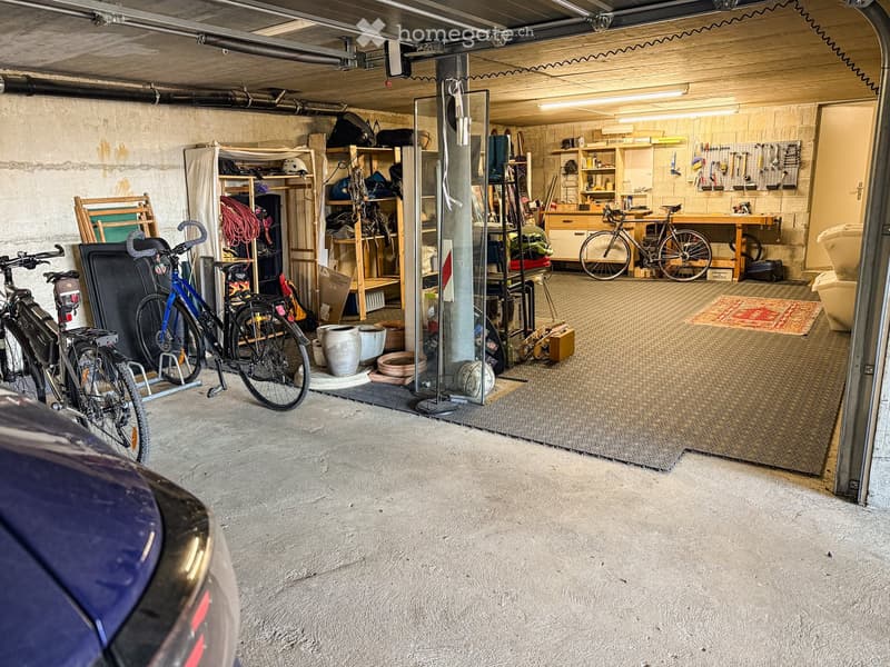 {"visible_features": ["Garage"], "type": "Other", "objects": ["bicycle", "bicycle", "bicycle", "bicycle", "bicycle", "bicycle", "bicycle", "bicycle", "bicycle", "bicycle", "bicycle", "bicycle", "bicycle", "bicycle", "bicycle", "bicycle", "bicycle", "bicyc