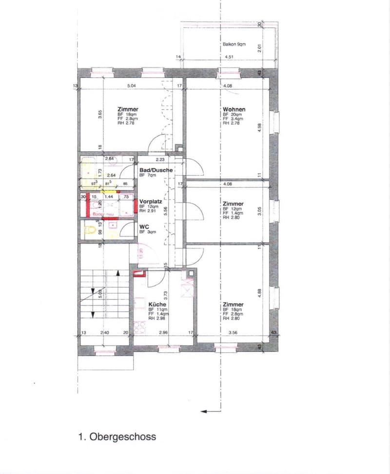 Floor plan of the upper floor showing a living room, kitchen, two bedrooms, bathroom, hallway, and WC.