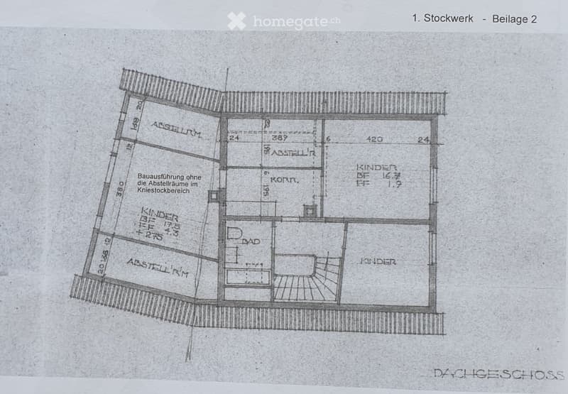 Floor plan of a residential building showing multiple rooms including a kitchen, living room, and bedrooms, with labeled dimensions and room names.