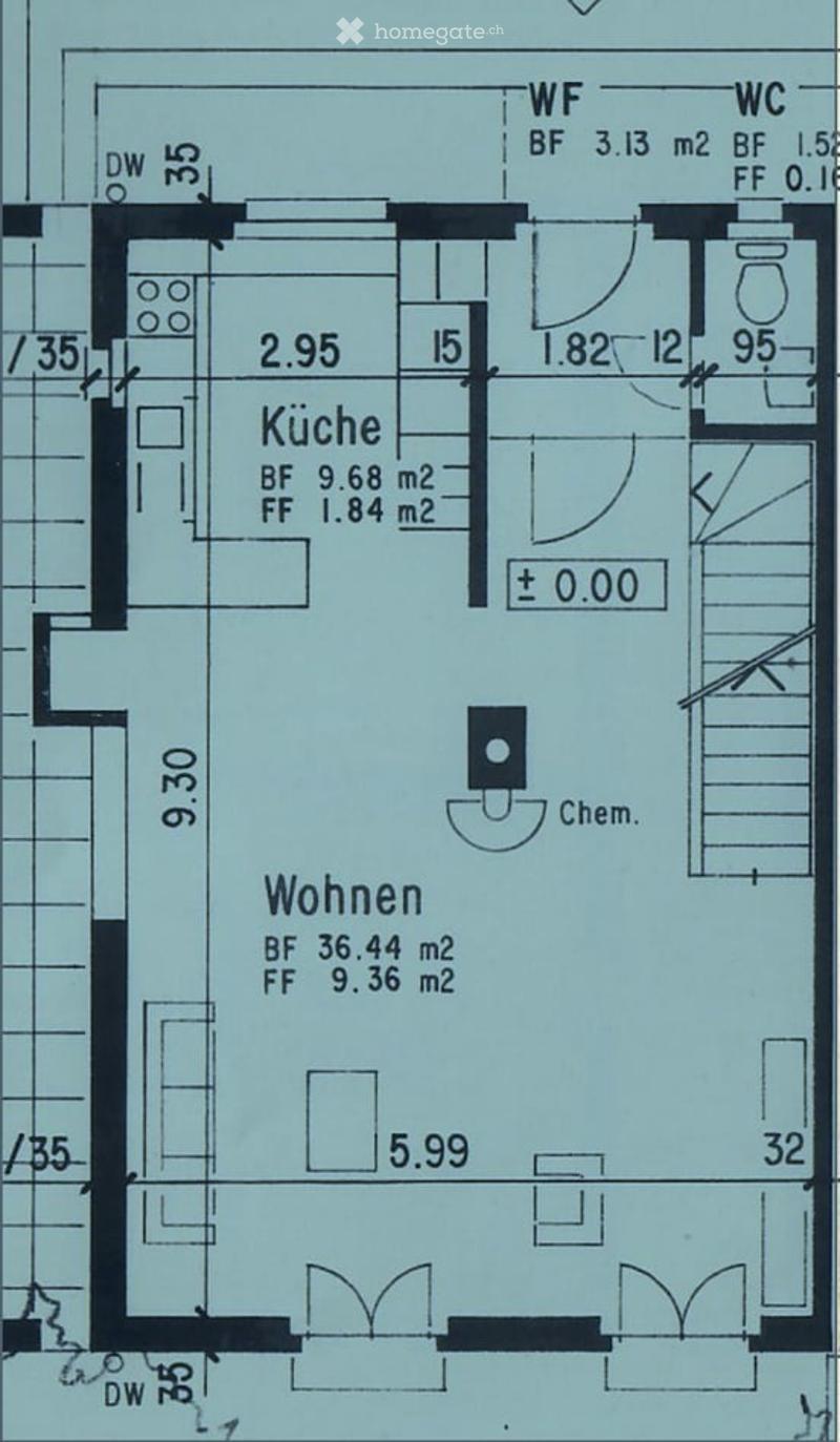 Floor plan showing a kitchen, living area, and bathroom with dimensions and room labels.