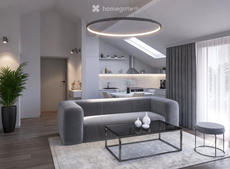 Modern living room with grey sectional sofa, glass coffee table, grey stool, sleek kitchen area with island, and large windows with grey curtains.