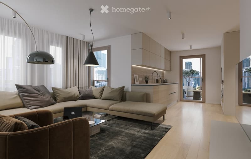 Modern living room with a sectional sofa, coffee table, laptop, books, armchair, and a small kitchen area with cabinets and a faucet. Large windows offer a city view.