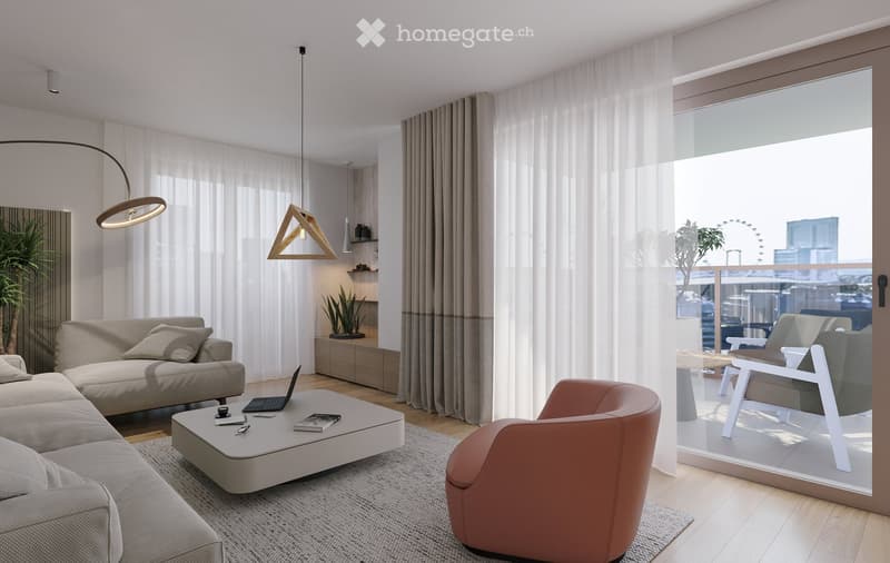Modern living room with a grey sofa, coffee table, laptop, and a pink armchair. Large windows with sheer curtains and a view of the city.