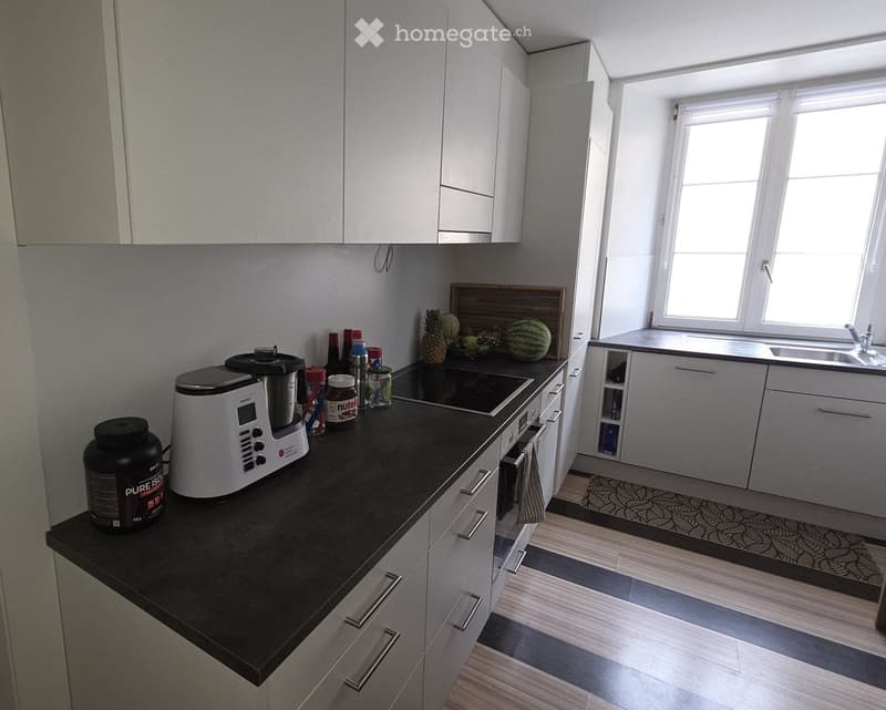 {"type": "Kitchen", "objects": ["oven", "fridge", "sink", "faucet", "cupboard", "bottle", "cup", "fridge", "oven", "bottle", "cupboard", "cupboard", "cupboard", "cupboard", "cupboard", "cupboard", "cupboard", "cupboard", "cupboard", "cupboard", "cupboard"
