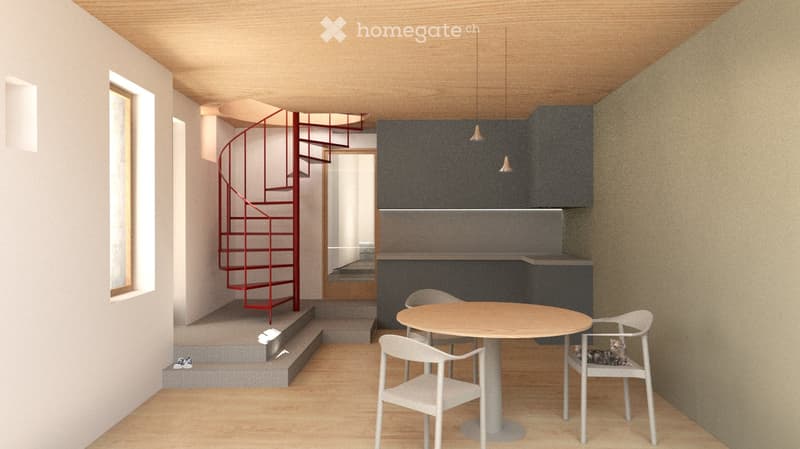 A modern, minimalist room with a round wooden table, white chairs, a small kitchen area with dark cabinets, and a red spiral staircase leading to an upper level.
