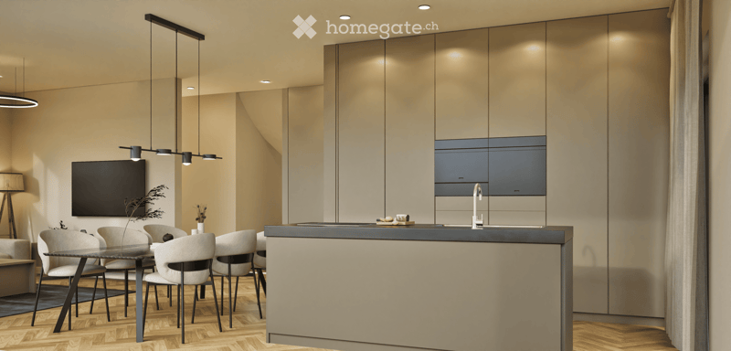 Modern open-plan living and dining area with a sleek kitchen island, dining table with chairs, pendant lights, and a television mounted on the wall.