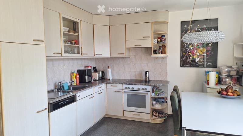 {"type": "Kitchen", "objects": ["sink", "faucet", "oven", "dishwasher", "coffee maker", "toaster", "cupboard", "bottle", "chair", "table", "fridge", "bottle", "cupboard", "bottle", "bottle", "bottle", "bottle", "bottle", "bottle", "bottle", "bottle", "bot