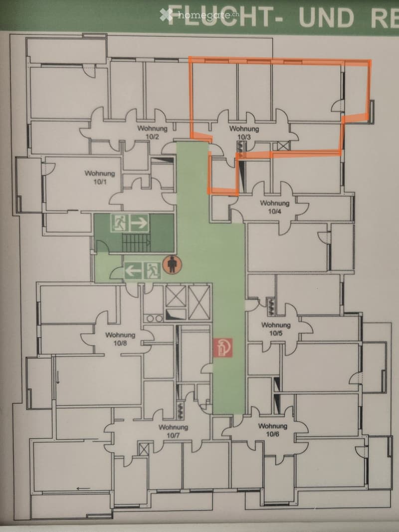 Floor plan showing multiple apartments labeled as Wohnungen 10/1 to 10/8, with a central green area marked as a staircase and emergency exit, and an elevator symbol in the center.