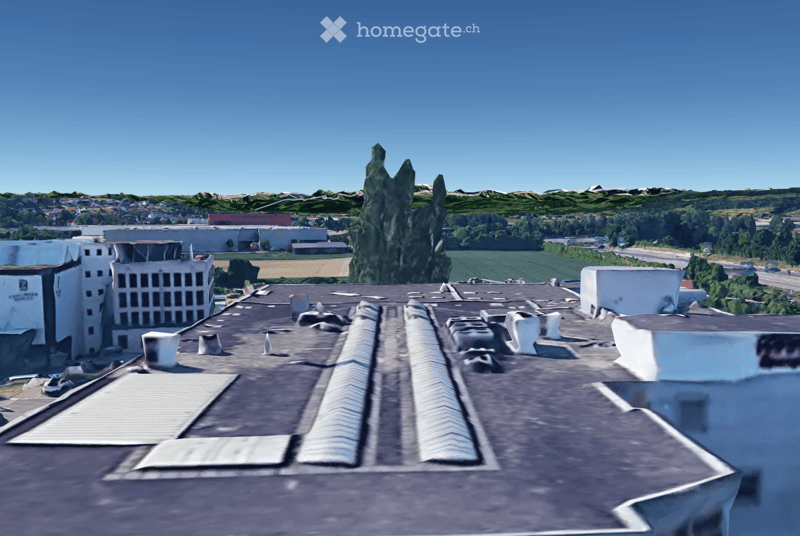 Building rooftop, gray roof, some ventilation pipes, visible chimneys, solar panels