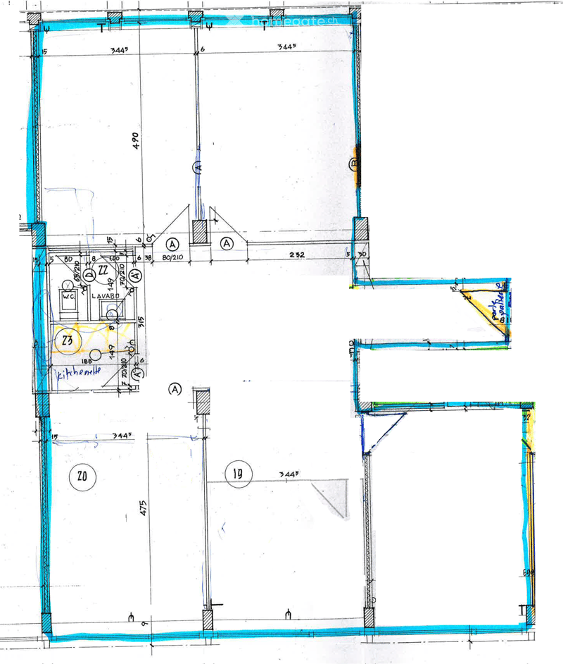 Floor plan showing a kitchen area, a bathroom, and a large open space. Dimensions and labels are marked throughout the layout.