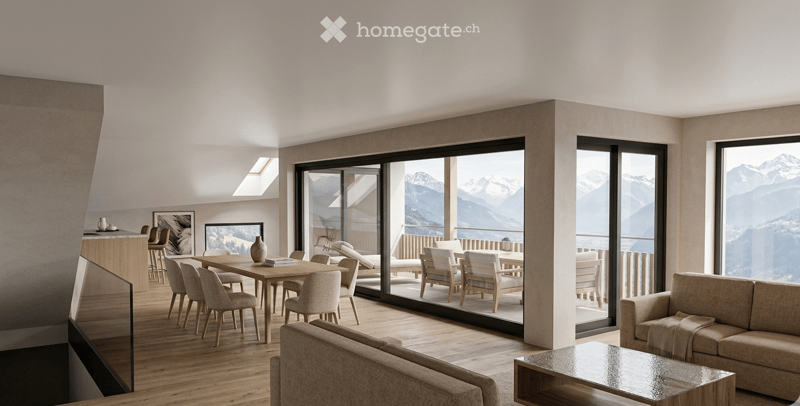 Bright, modern living and dining area with large windows offering a scenic mountain view. Features a sofa, coffee table, dining table with chairs, and a small bar area with stools.