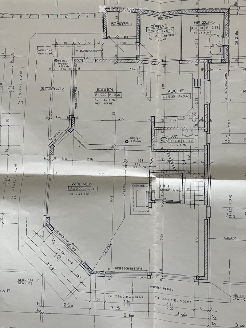 Floor plan showing a layout with labeled rooms including a kitchen, living area, dining area, sitting area, WC, and garage.