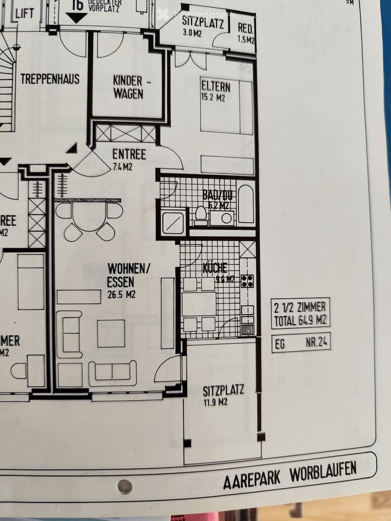Floor plan of a 2.5-room apartment with labeled areas including entrance, living/dining area, kitchen, bathroom, children's room, parents' room, and seating areas.