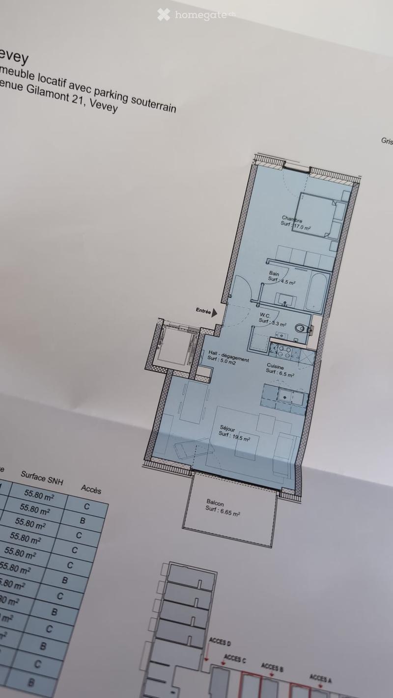 Floor plan of an apartment with living room, kitchen, bedroom, bathroom, hallway, and balcony.