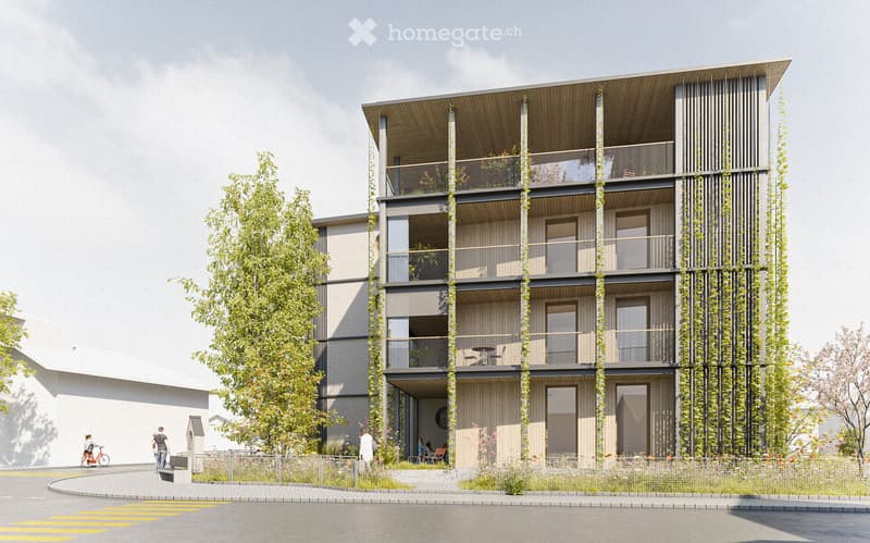 Modern multi-story building with balconies, greenery, and contemporary design. Features include large windows, a raised ground floor, and a sleek, minimalist aesthetic.